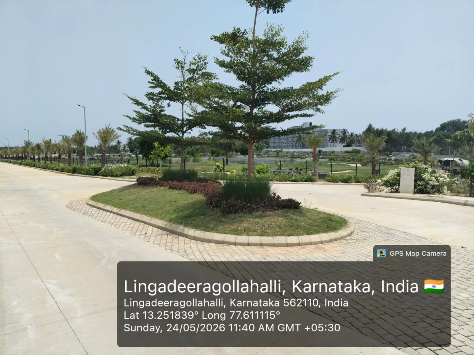 Clubhouse and landscaped roundabout at Arvind The Park